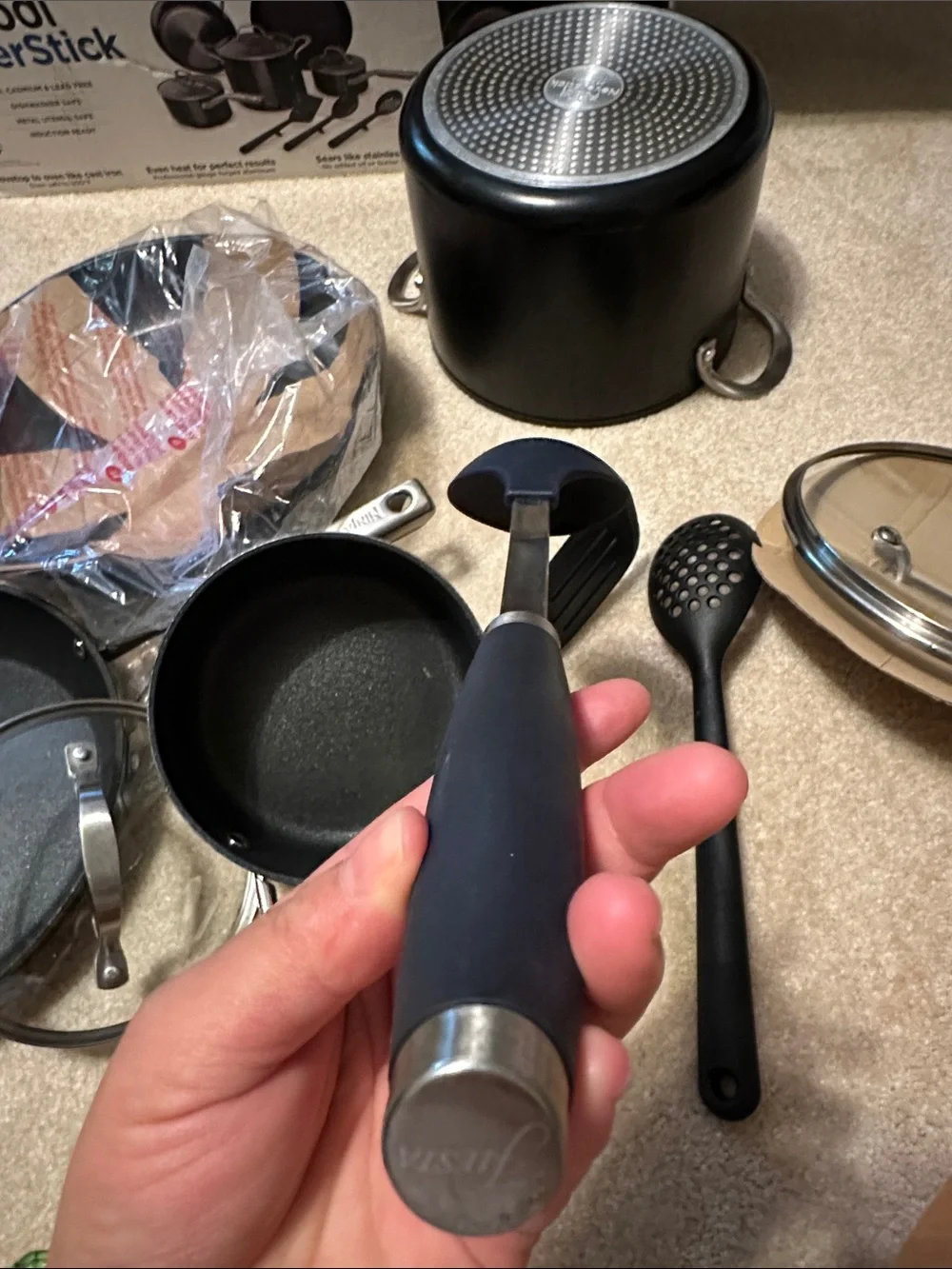 Ninja cookware set in black and stainless steel with glass lid